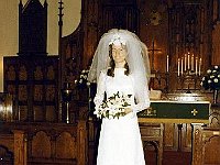 Ruth at altar in wedding dress