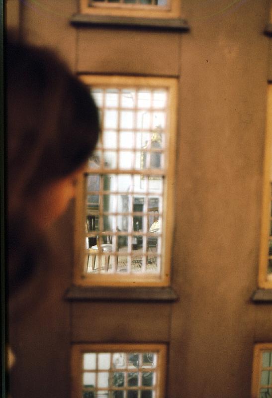 doll's_house_window_Ruth Ruth peering into a doll's house window.