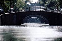 Amsterdam_canal_bridges Amsterdam is a city with many concentric canals. This slide show has shots from my trip there in 1970 and my visit there with Ruth in 1974.