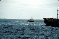 Untitled-Scanned-08 A sister tug also approaches the tanker.