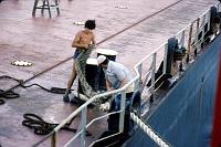 Untitled-Scanned-09 The tanker's crew fastens one of our tug's lines.