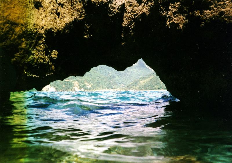 ScottsHead_arch Arch at Scott's Head beach.  A small school of 3-inch-long shiny silver hatchetfish can always be seen beneath the arch, which is just large enough to allow a snorkeler to pass through.