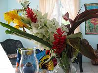 IMG_0270 Bouquet has Heliconia sp., Alpinia purpurata, Jatropha podagrica, Plectranthus scutellarioides = Coleus blumei, Cordyline terminalis.