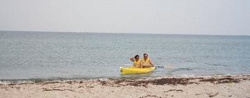 dt-sandy-kayak I took Sandy and Pete kayaking from State Beach in Oak Bluffs up to the “Jaws Bridge” to Edgartown. This is me returning with Sandy.