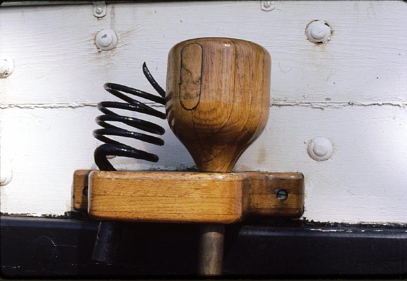 19-cannon_tools The corkscrew-like device was for cleaning cannon bores, and the wooden device was for ramming powder, wad and shot into the cannon.  They each woudl attach to handles.