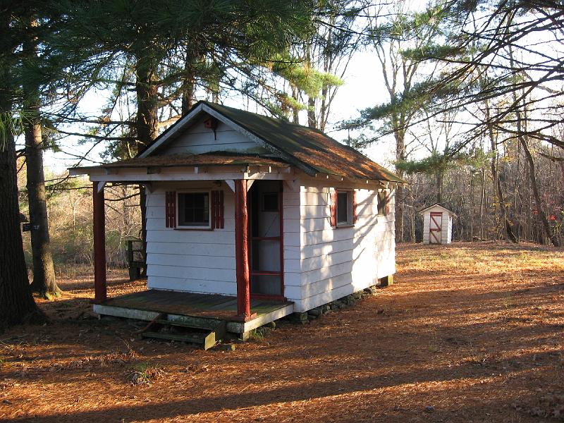 IMG_0673 Before we built our cabin we stayed at the now-defunct Echo Valley cabins.  This is one of three still standing. The rear section is an added bathroom; when we stayed there they had no running water, and Dad made us wash at the outdoor pump each morning while he woke everyine with his yodeling. Note the old communal outhouse behind the cabin.
