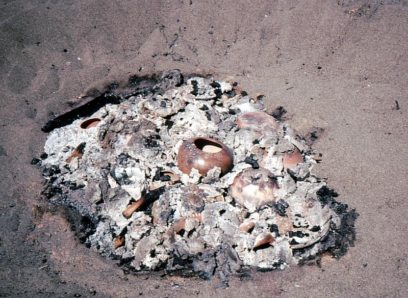 22-firing_pottery_on_the_beach People were firing pottery on the beach in an Indian method.