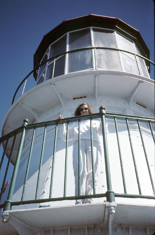 35_Ruth_on_Point_Reyes_light Ruth on the Point Reyes light.  It's about 600 steps down to the lighthouse.  With binoculars from here on a clear day you can see the Farallon Islands (Wikipedia: a group of islands and rocks found in the Gulf of the Farallones, off the coast of San Francisco, California, USA. They lie 27 miles (43 km) outside the Golden Gate, 20 miles (32 km) south of Point Reyes).