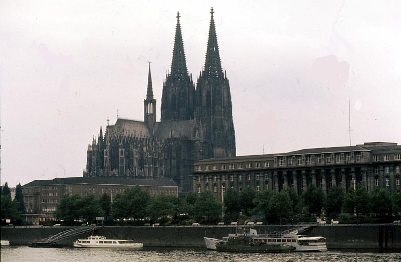 Cologne_Cathedral Cathedral at Cologne, one of the best-known architectural monuments in Germany and has been Cologne's most famous landmark since its completion in the late 19th century. The cathedral is under the administration of the Roman Catholic Church and is the seat of the Archbishop of Cologne. Cologne Cathedral is the church with the largest facade (the west or main facade with the twin towers) and remains the second-tallest Gothic structure in the world; only the steeple of the Ulm Münster is higher. [Wikipedia]