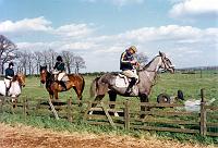 3 Left to tight, the instructor, the stable owner's daughter, and the stable owner.