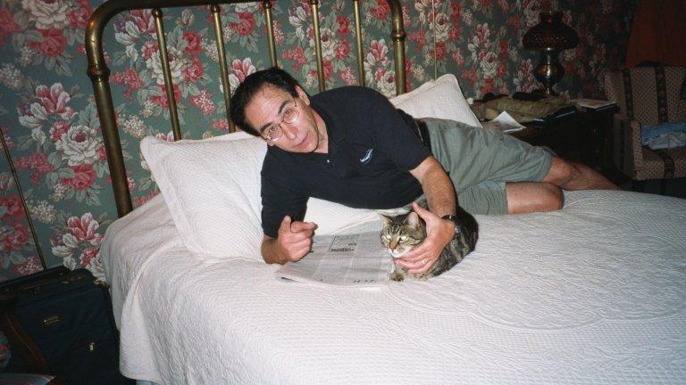 dan-cat-ogi Me in our room with one of the Old Granite Inn's house-cats.