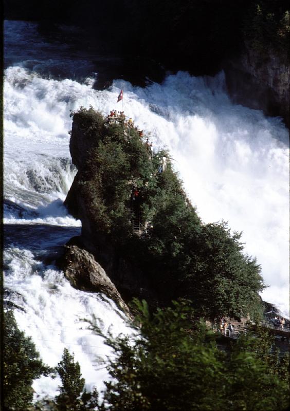 Rheinfall_rock You can cross the Rhein to the platform or go to this central rock on small boats.  In my father's day, teh boats were rowed.  You just have to know the currents and eddies.