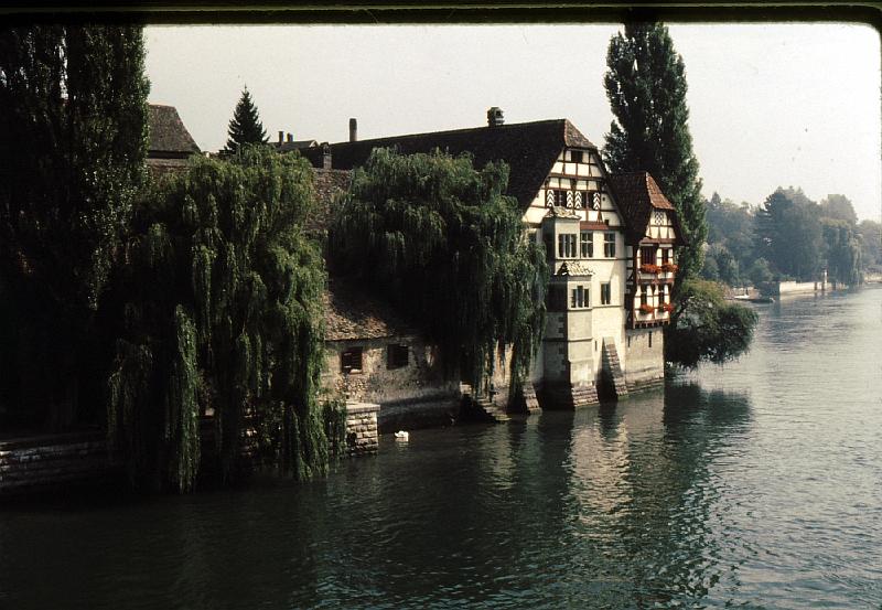 Stein_Rhine Halfway between Schaffhausen and the lake is the restored tourism town of Stein am Rhein, which is also in the Schaffhausen canton. The town has a well preserved medieval centre, retaining the ancient street plan. The site of the city wall, and the city gates are preserved, though the former city wall now consists of houses. The medieval part of the town has been pedestrianised and is a peaceful and charming environment. Many of the medieval buildings are painted with beautiful frescos.