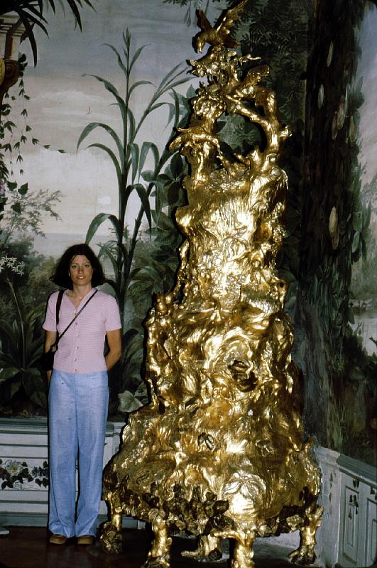 stove_2 The heating stoves were fascinating.  Here Ruth stands next to a gilded one to show scale.  Servents other than personal courtiers were never seen; they moved about within the walls like so many mice, doing things like filling the stoves and removing ashes.